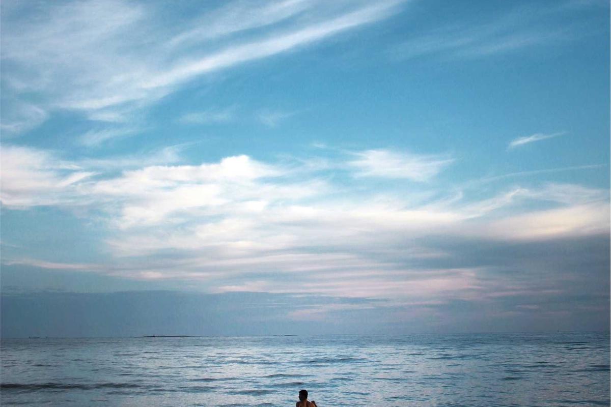 a collection of personal items ready to be placed into a time capsule