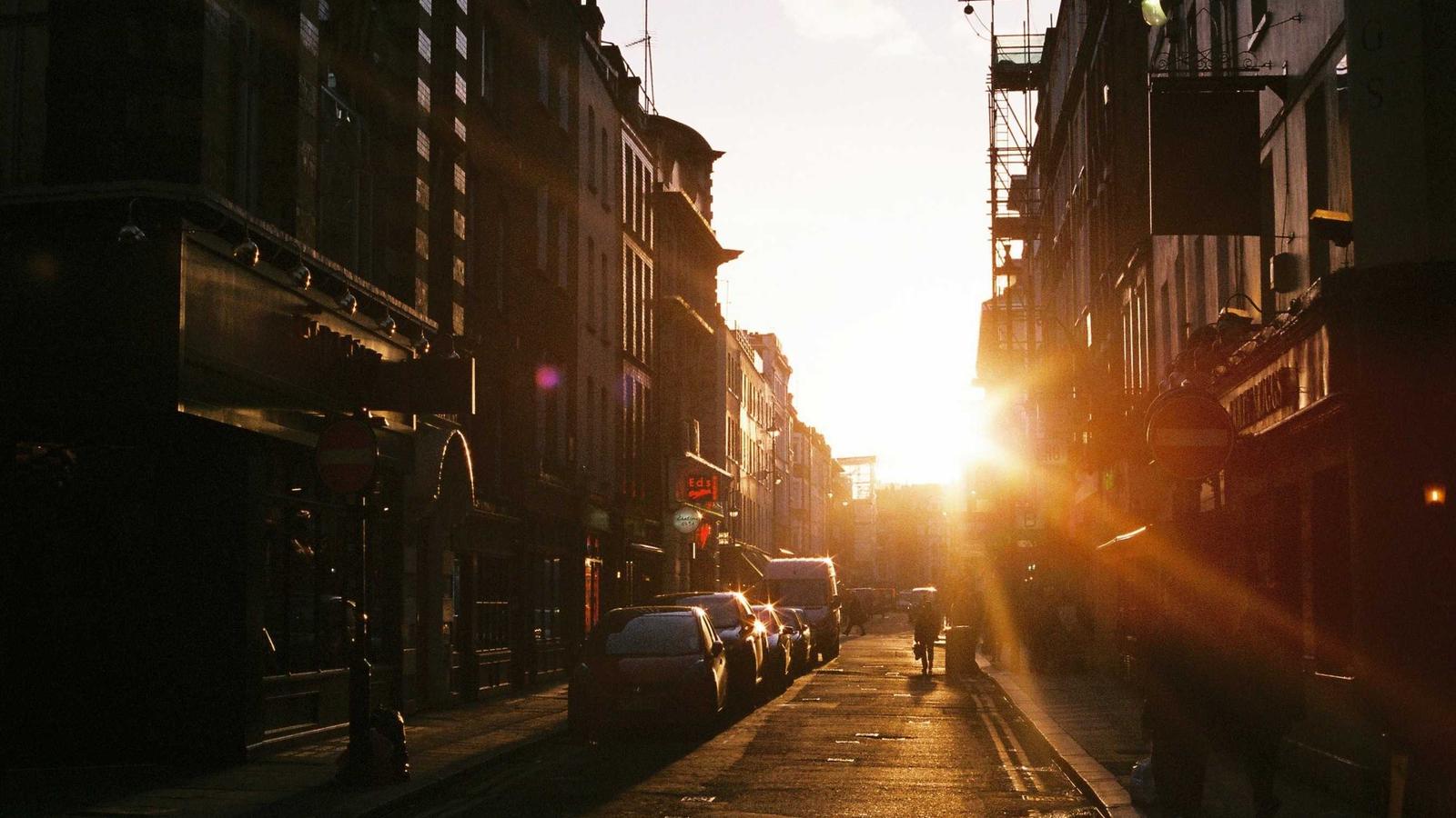 Split screen showing physical memorabilia next to their digital counterparts (letters/emails, photos/digital albums)