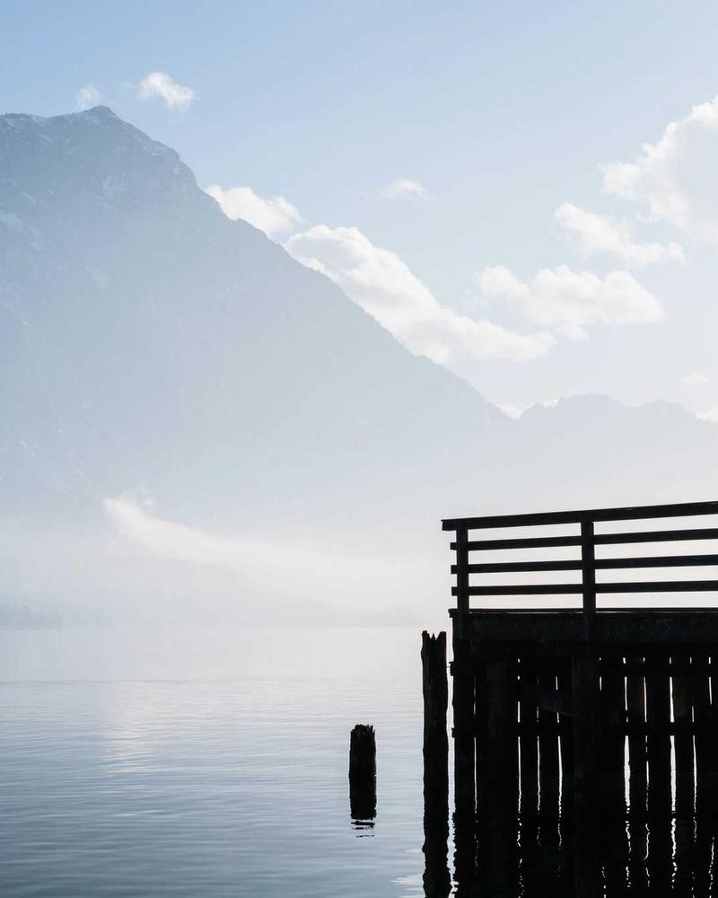 A person sealing an envelope with a wax seal