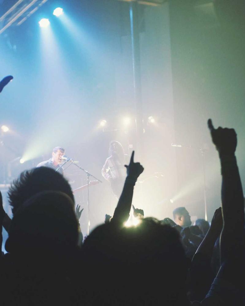 A serene image of a family watching a digital slideshow together
