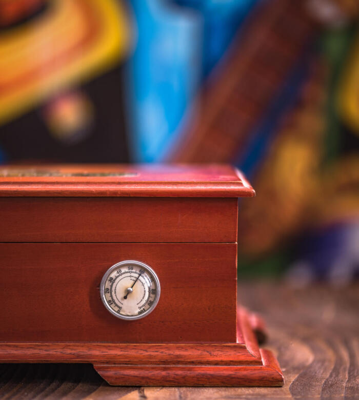 Wooden luxury humidor for cigar storage.